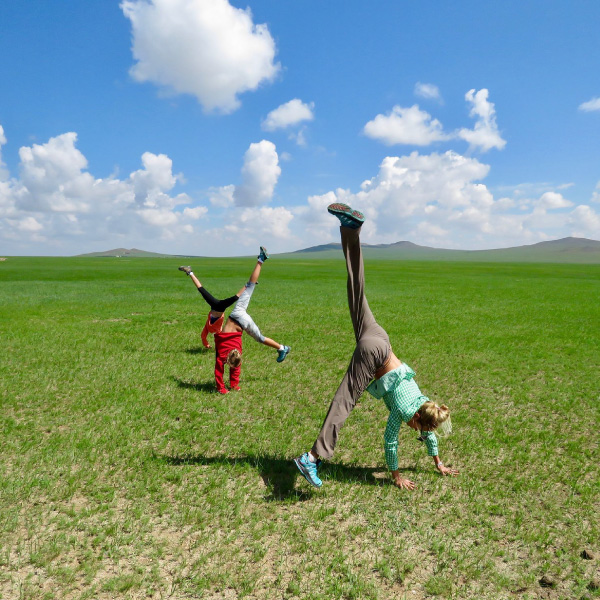 Cartwheels out on the Mongolian steppe during Mongolia family holidays
