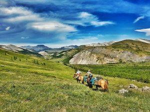 The panoramic view from horseback during our Khoridol Saridag horse trek in Mongolia's Khovsgol Nuur National Park. Taken during one of our Mongolia trekking tours
