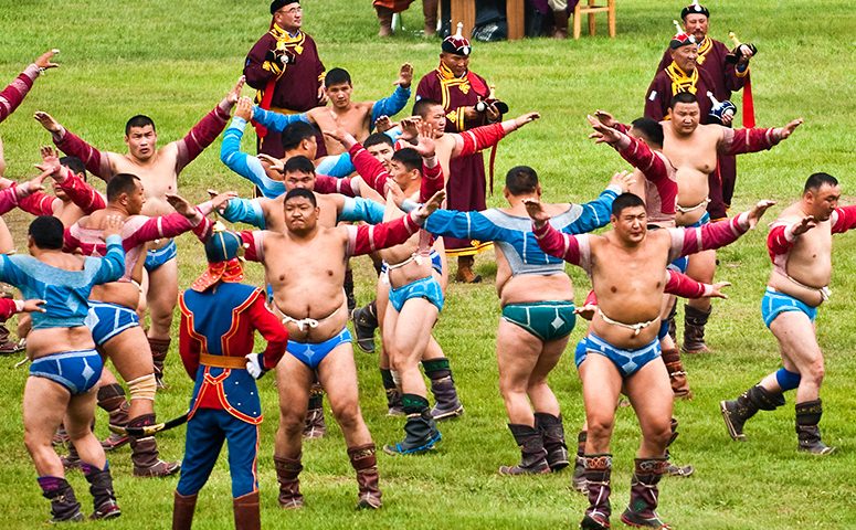Mongolian wrestlers doing their famous 'eagle dance' prior to competing at the Mongolian wrestling competition