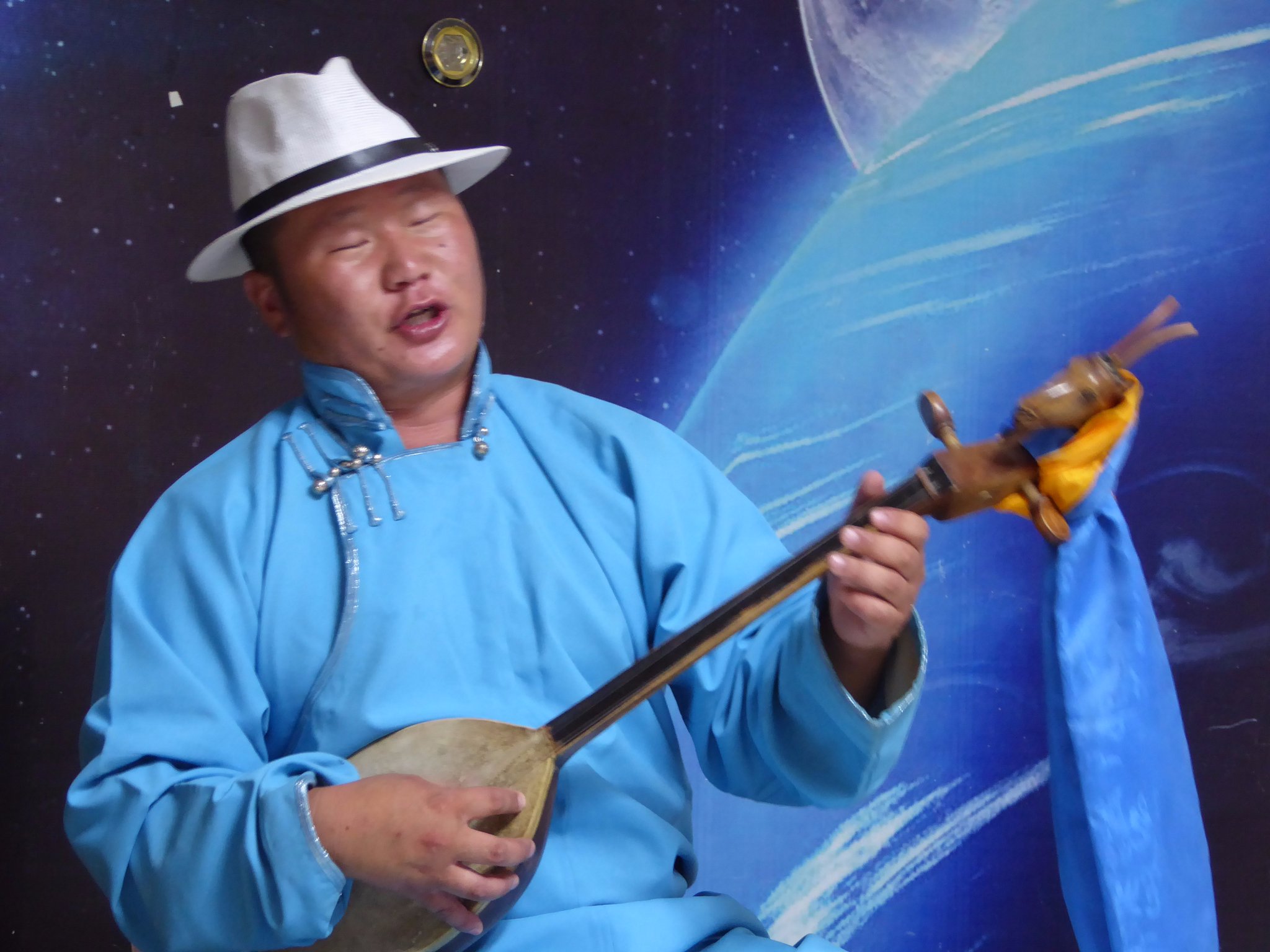 This is Erdeneochir - a talented Mongolian musician. His musical skills include the art of khoomi (throat singing) and playing the horse head fiddle.