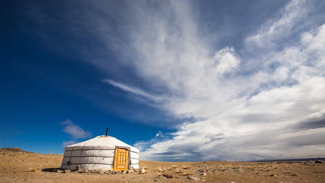 A Mongolian ger surrounded by the immensity of Mongolia's middle Gobi Desert landscapes