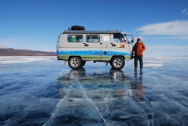 An image of Turuu (my business partner) and his beloved Russian 4x4 Furgon van on the frozen ice surfaces of Khovsgol Nuur in Northern Mongolia.