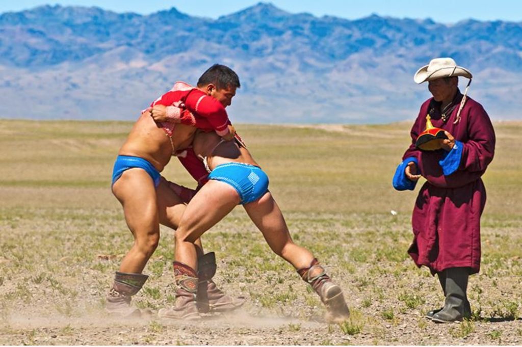 Mongolian Naadam wrestlers in the Gobi desert