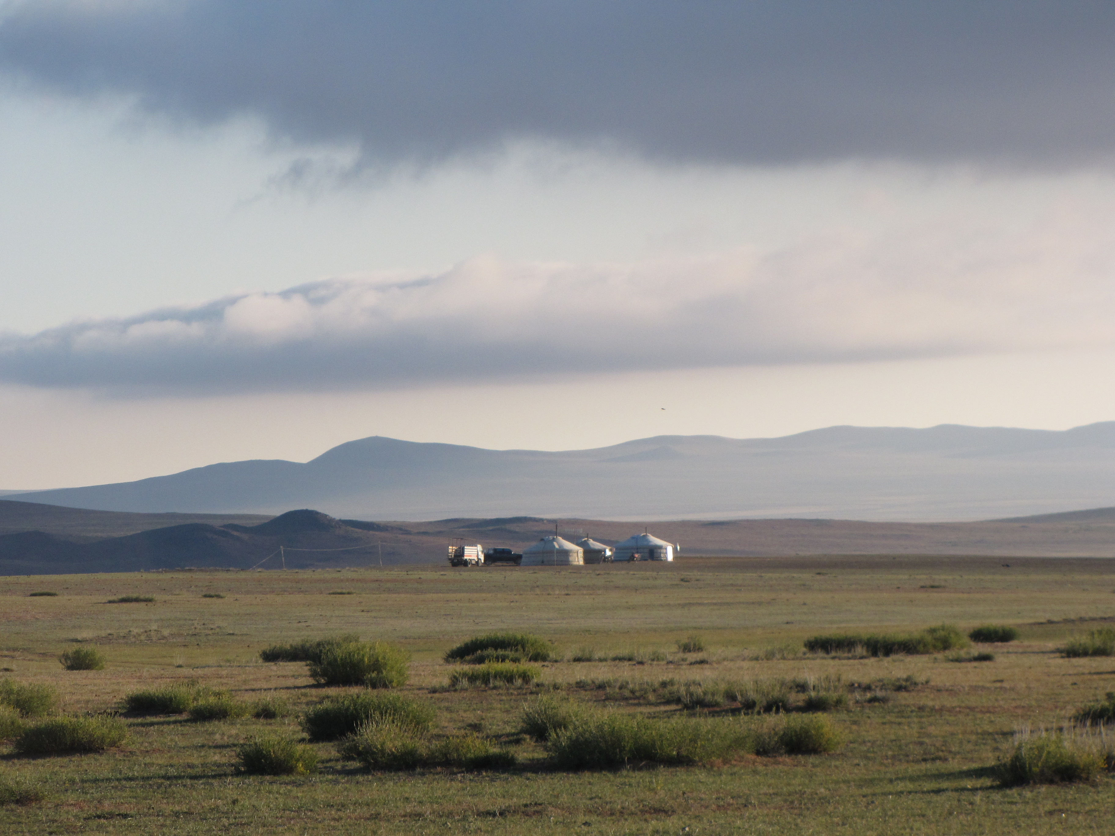 Mongolian gers in the wide open steppe landscape of Mongolia. This is the real Mongolia.