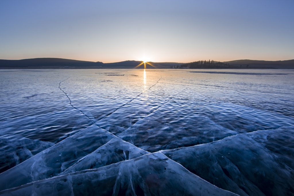 Sunrise Over Frozen Lake Khuvsgul In Northern Mongolia Eternal Sunrise Over Frozen Lake Khuvsgul In Northern Mongolia Eternal