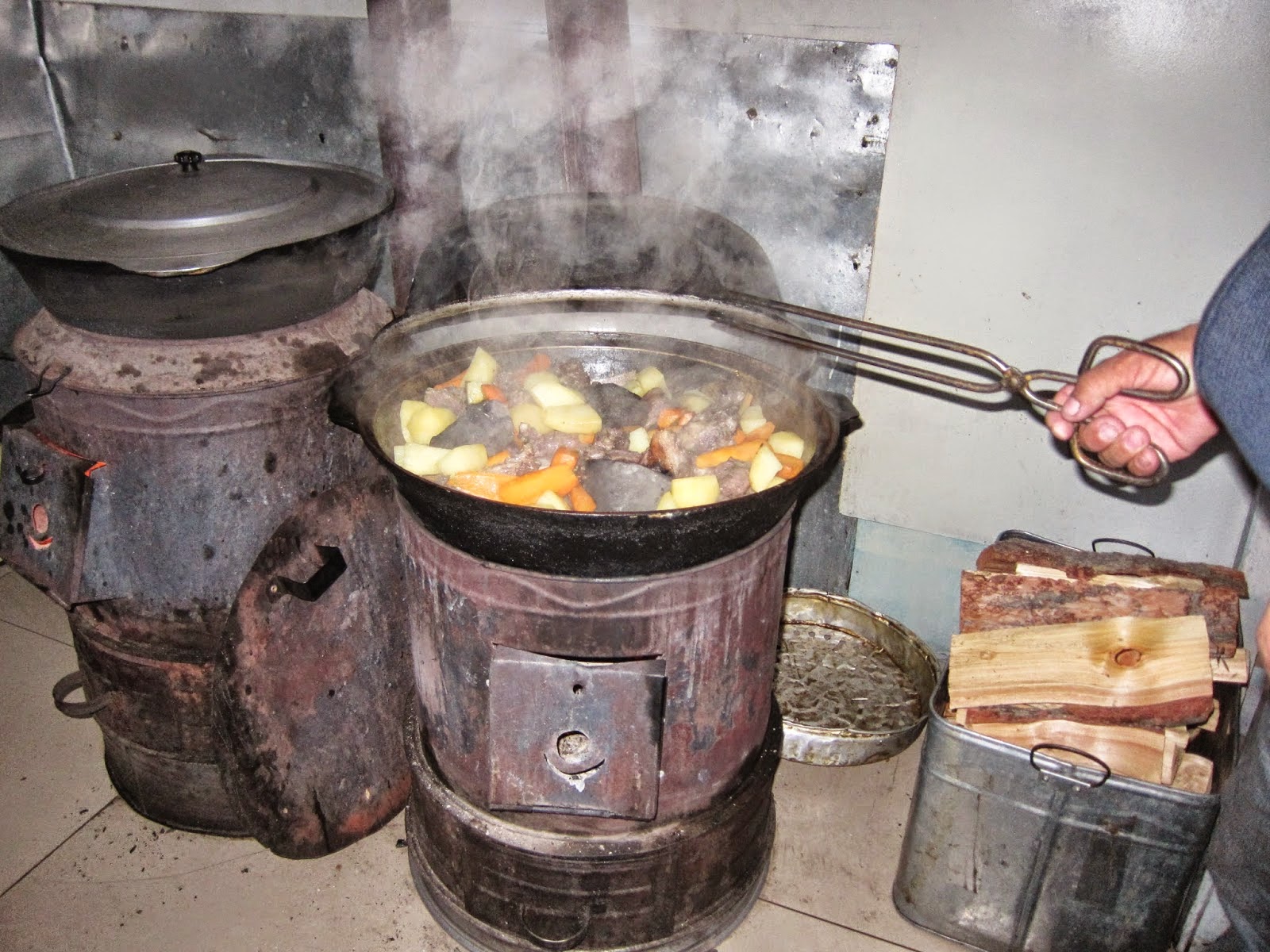 Cooking the traditional Mongolian barbecue