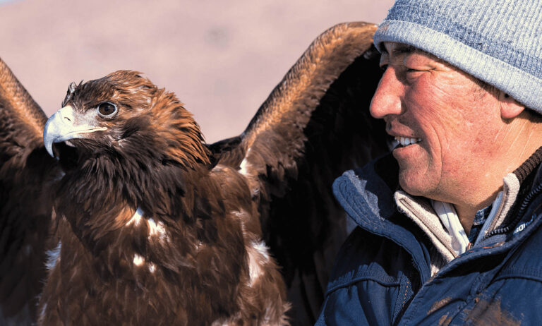 Mongolian eagle hunter and his eagle